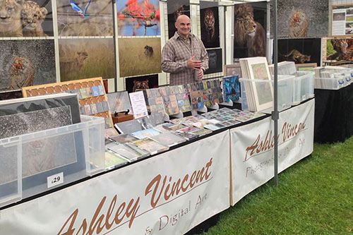Ashley Vincent at his picture display stand at Highclere Castle County Show