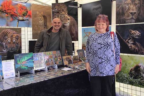 ashley vincent engaging with customer at the early May Eastbourne market