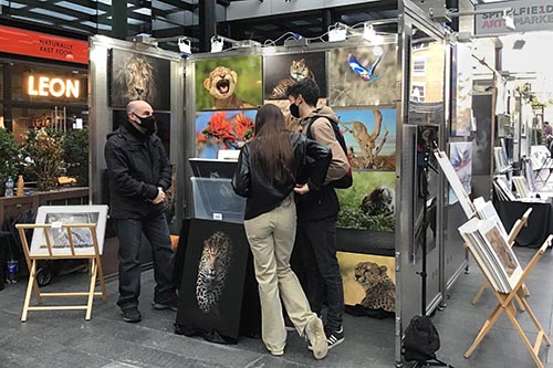 ashley vincent engaging with customers at the Spitalfileds Arts Market in London
