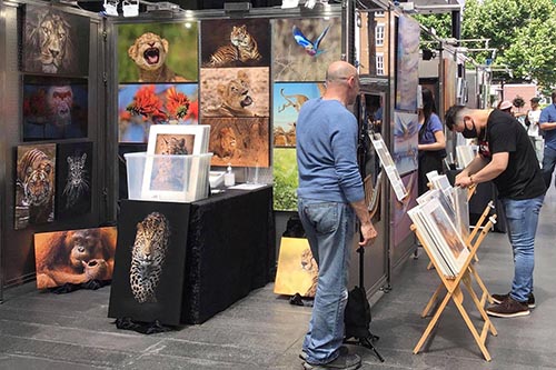 ashley Vincent watching over customers at the Spitalfileds Arts Market in London