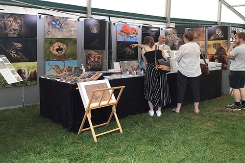 ashley vincent engaging with customers at the Henley County Craft Show