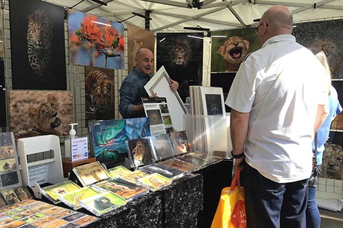 ashley vincent engaging with customers at the Thame Spring Market
