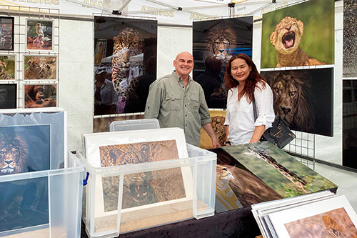 Ashley Vincent with customer at the 2023 Basingstoke Thai Festival