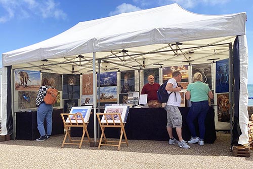 Ashley Vincent engaging with customers at the Eastbourne Late Spring Market 2024